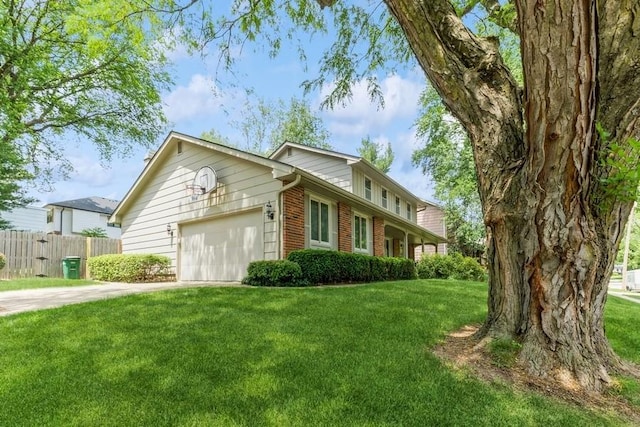 520 34th Pl, West Des Moines, IA 50265 - view of home's exterior with a garage and brick siding