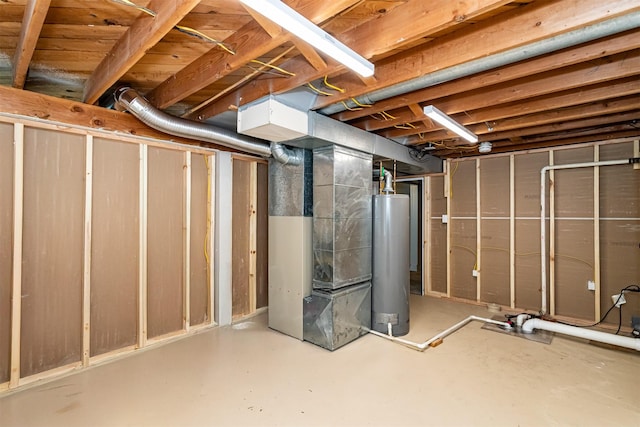1621 Carroll Ave, Ames, IA 50010 - unfinished below grade area featuring water heater and heating unit