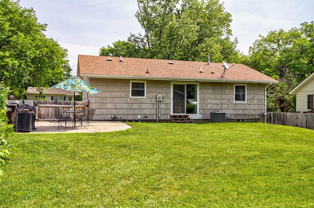 1621 Carroll Ave, Ames, IA 50010 - back of house featuring a patio and a shingled roof