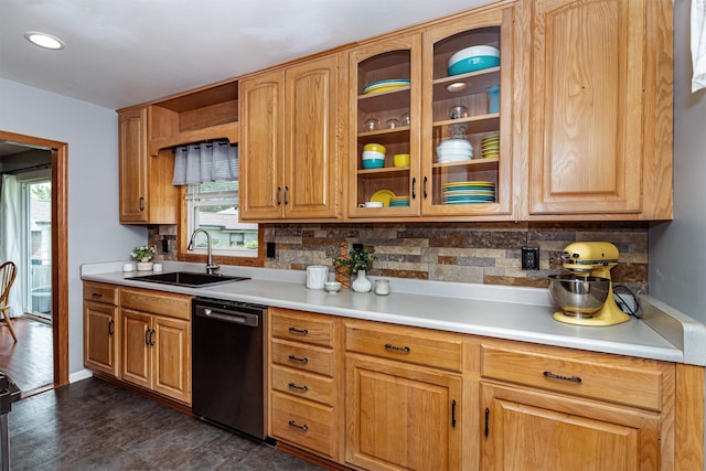 1621 Carroll Ave, Ames, IA 50010 - kitchen with dishwasher, backsplash, and light countertops