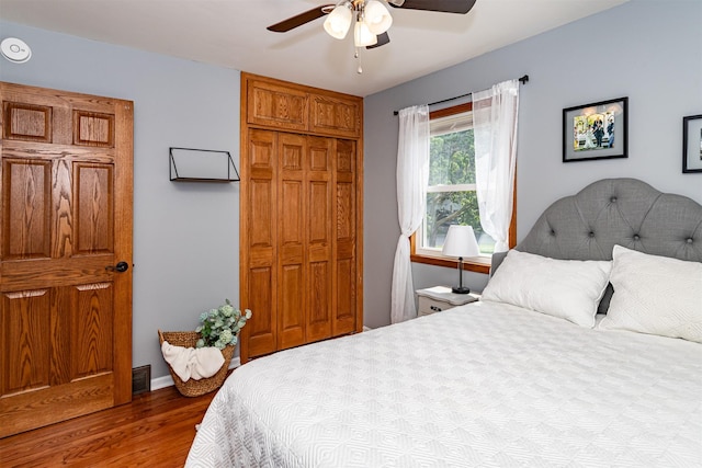 1621 Carroll Ave, Ames, IA 50010 - bedroom with a closet, wood finished floors, and a ceiling fan