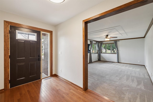 506 2nd Ave SW, Altoona, IA 50009 - foyer entrance with ceiling fan and light wood finished floors