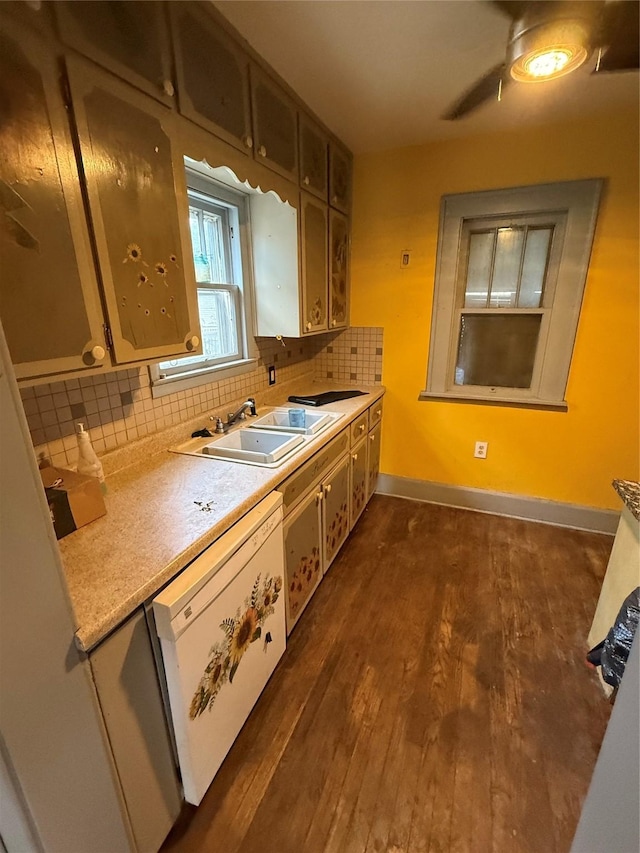 208 E 16th St, Des Moines, IA 50316 - kitchen with dishwasher, tasteful backsplash, dark wood finished floors, and light countertops