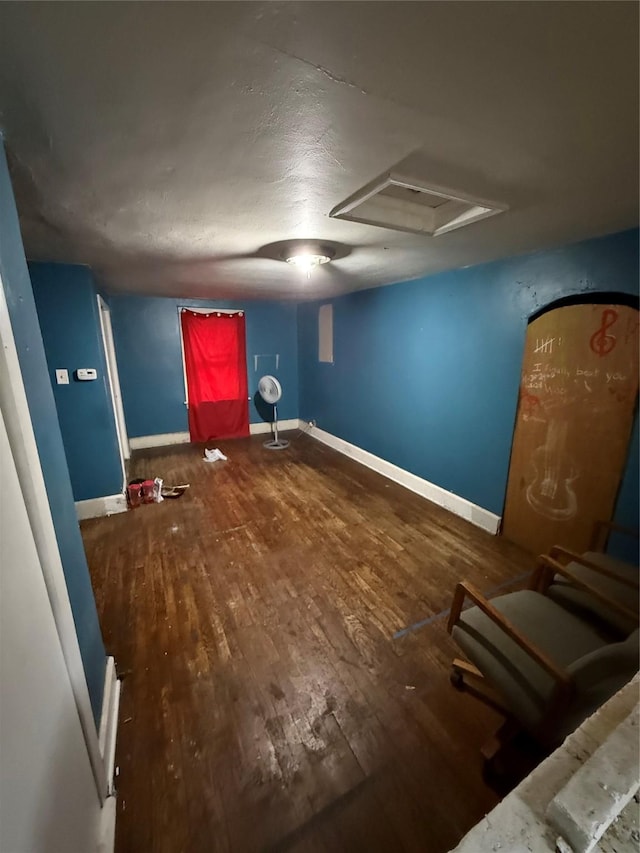 208 E 16th St, Des Moines, IA 50316 - basement with wood finished floors and baseboards