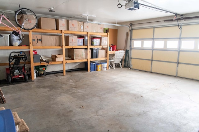 106 Park Ridge Dr, Otley, IA 50214 - garage featuring a garage door opener
