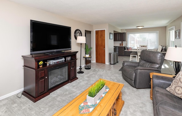 1808 60th St, Des Moines, IA 50322 - living room with light colored carpet and baseboards