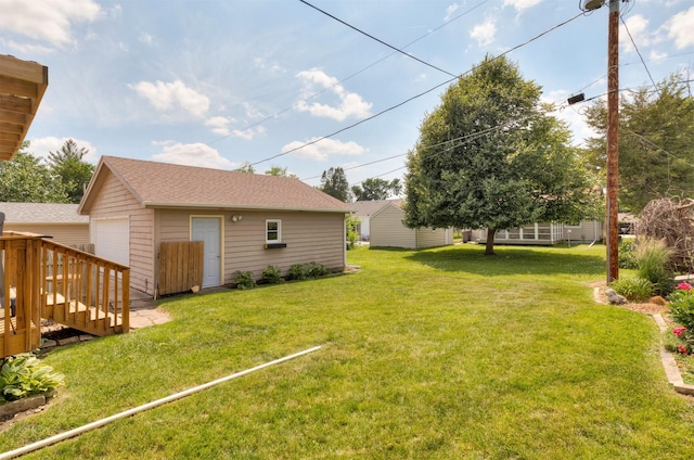 1808 60th St, Des Moines, IA 50322 - view of green lawn featuring an outdoor structure
