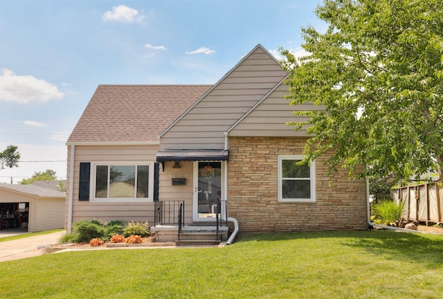 1808 60th St, Des Moines, IA 50322 - bungalow-style house with stone siding and roof with shingles