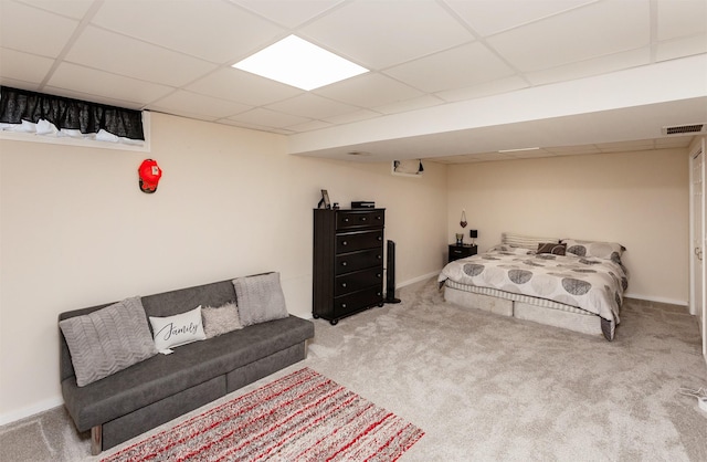 4505/4507 51st St, Des Moines, IA 50310 - carpeted bedroom with a drop ceiling and baseboards