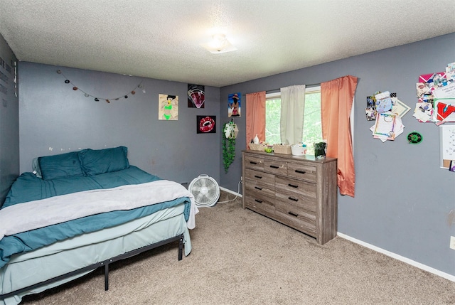 4505/4507 51st St, Des Moines, IA 50310 - bedroom with a textured ceiling and light carpet