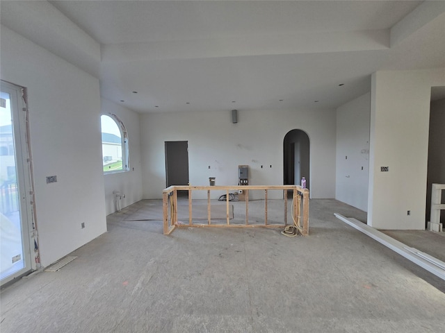 4617 Centennial Blvd, Urbandale, IA 50323 - carpeted spare room featuring arched walkways