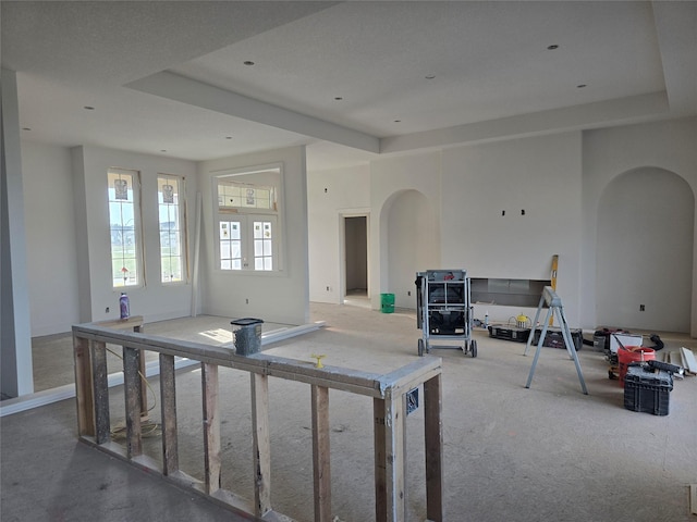 4617 Centennial Blvd, Urbandale, IA 50323 - living room with arched walkways and carpet floors