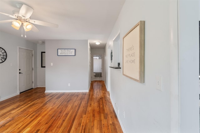 1329 63rd St, Des Moines, IA 50311 - empty room featuring light wood-type flooring and a ceiling fan