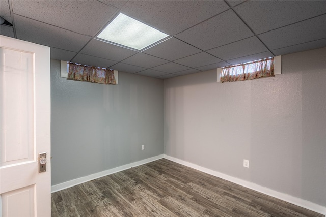 1329 63rd St, Des Moines, IA 50311 - finished basement featuring a paneled ceiling and dark wood finished floors
