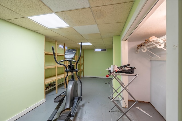 1329 63rd St, Des Moines, IA 50311 - exercise room with a drop ceiling and baseboards