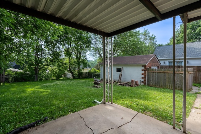1329 63rd St, Des Moines, IA 50311 - fenced backyard with a patio