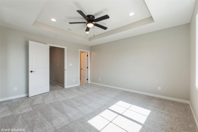 7000 Lake Hill Dr Unit 74, Des Moines, IA 50320 - unfurnished bedroom with a raised ceiling, light carpet, recessed lighting, and a ceiling fan