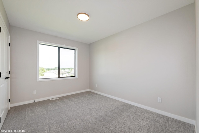 7000 Lake Hill Dr Unit 74, Des Moines, IA 50320 - carpeted spare room featuring baseboards