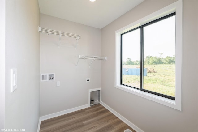 7000 Lake Hill Dr Unit 74, Des Moines, IA 50320 - laundry area with hookup for an electric dryer, hookup for a washing machine, and wood finished floors