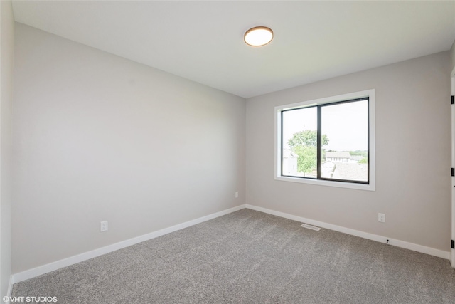 7000 Lake Hill Dr Unit 74, Des Moines, IA 50320 - empty room featuring carpet and baseboards