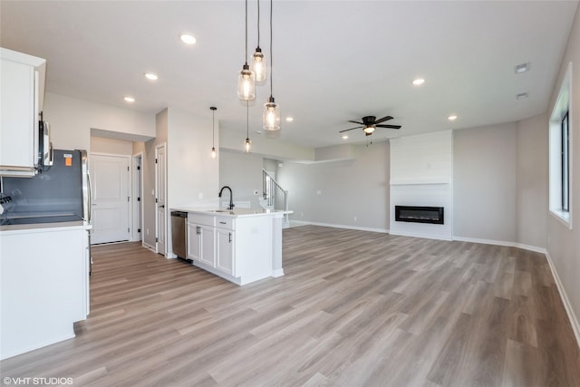 7000 Lake Hill Dr Unit 74, Des Moines, IA 50320 - kitchen featuring a ceiling fan, white cabinets, recessed lighting, light wood-type flooring, and dishwasher