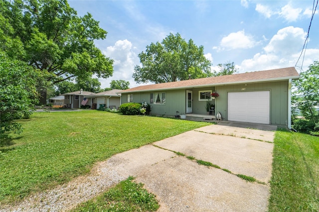516 Walnut St, De Soto, IA 50069 - ranch-style home featuring a garage, driveway, a front yard, and crawl space