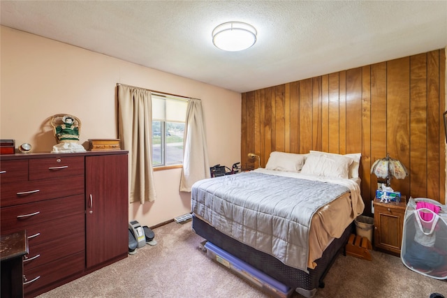 516 Walnut St, De Soto, IA 50069 - carpeted bedroom featuring wooden walls