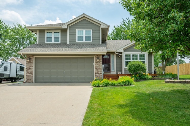 5145 Sycamore Dr, Pleasant Hill, IA 50327 - view of front of home featuring an attached garage, concrete driveway, brick siding, and a shingled roof
