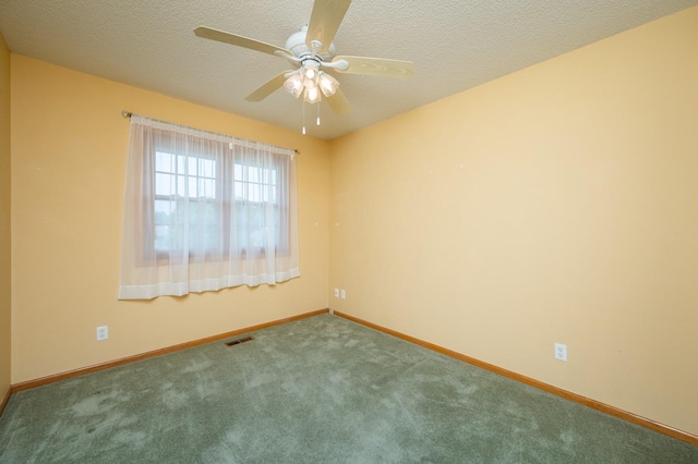 5145 Sycamore Dr, Pleasant Hill, IA 50327 - carpeted empty room featuring a ceiling fan and a textured ceiling