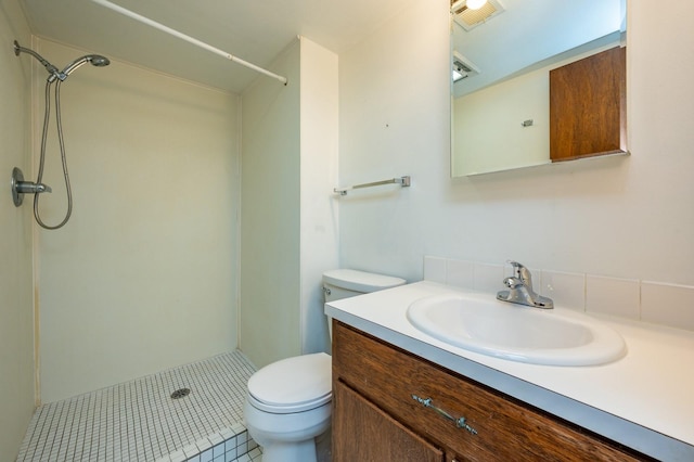 1005 32nd St, West Des Moines, IA 50266 - bathroom featuring a shower, vanity, and tile patterned floors