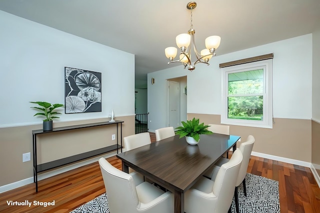 1005 32nd St, West Des Moines, IA 50266 - dining area with a chandelier and wood finished floors
