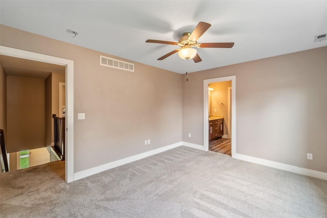611 Court St, Adel, IA 50003 - carpeted spare room featuring ceiling fan and baseboards