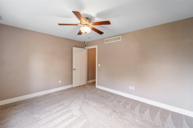 611 Court St, Adel, IA 50003 - empty room featuring ceiling fan and carpet