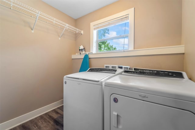 611 Court St, Adel, IA 50003 - washroom with washing machine and clothes dryer and dark wood-style floors