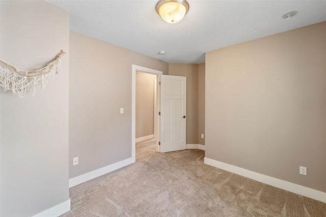 611 Court St, Adel, IA 50003 - carpeted spare room with baseboards