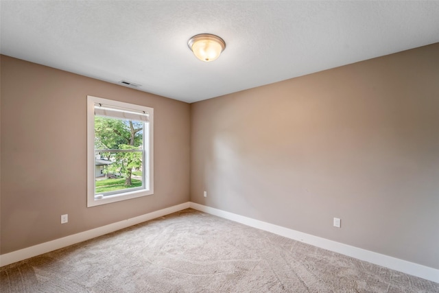 611 Court St, Adel, IA 50003 - carpeted spare room featuring baseboards