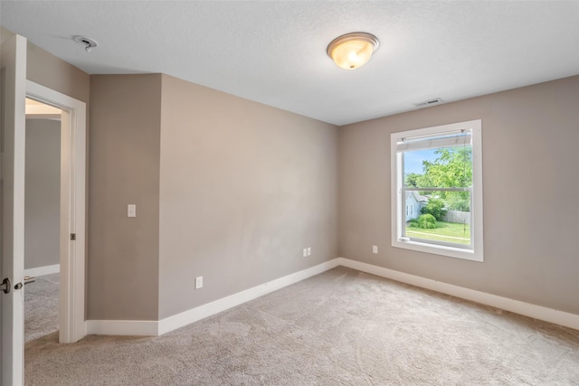 611 Court St, Adel, IA 50003 - empty room with carpet and baseboards