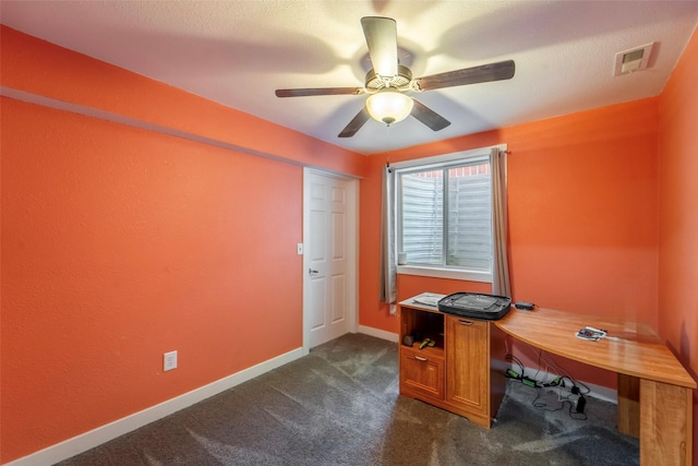 611 Court St, Adel, IA 50003 - office area with dark carpet and ceiling fan