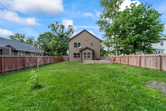 611 Court St, Adel, IA 50003 - rear view of property with a fenced backyard and a patio area