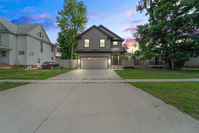 611 Court St, Adel, IA 50003 - traditional home featuring a garage and driveway