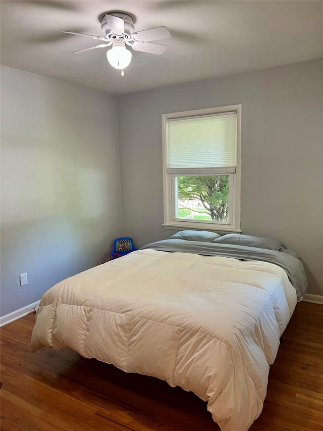 4301 43rd St, Des Moines, IA 50310 - bedroom featuring wood finished floors and a ceiling fan