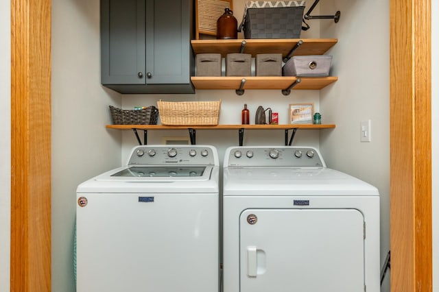 5221 Village Run Ave Unit 1201, Des Moines, IA 50317 - washroom with cabinet space and washing machine and clothes dryer