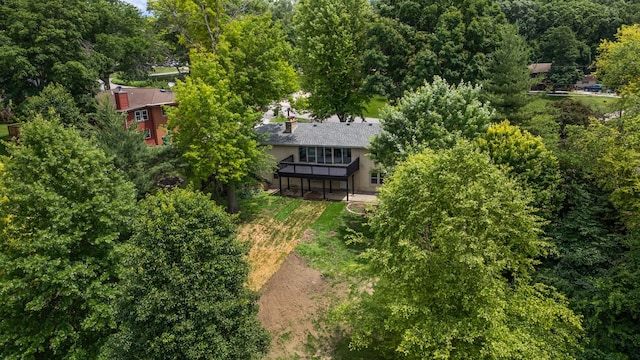 6730 NW Timberline Dr, Des Moines, IA 50313 - aerial view of property and surrounding area featuring a forest