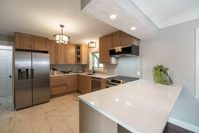 6730 NW Timberline Dr, Des Moines, IA 50313 - kitchen featuring appliances with stainless steel finishes, a peninsula, light marble finish flooring, glass insert cabinets, and recessed lighting
