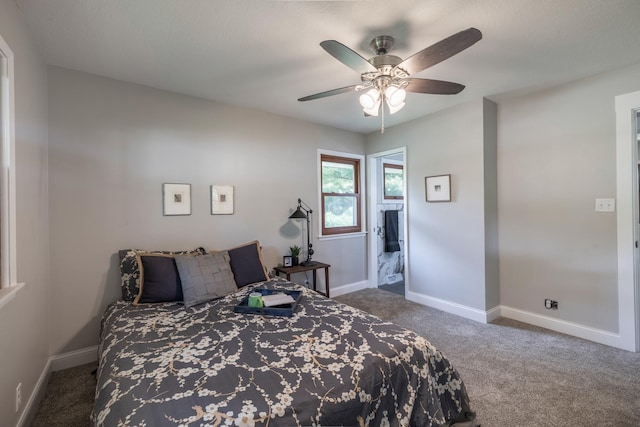 6730 NW Timberline Dr, Des Moines, IA 50313 - carpeted bedroom with a ceiling fan and baseboards