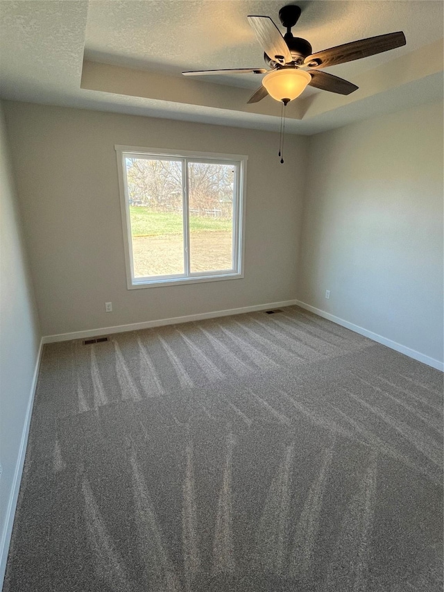 711 W N Ave, Norwalk, IA 50211 - empty room with a ceiling fan, carpet floors, and a textured ceiling