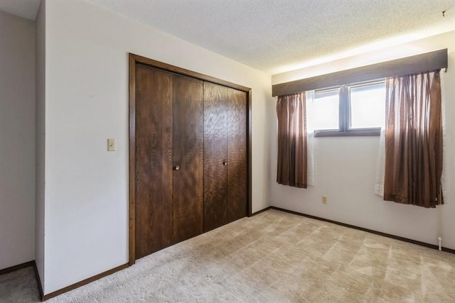 2907 Northwood Dr, Ames, IA 50010 - unfurnished bedroom with light colored carpet and a closet