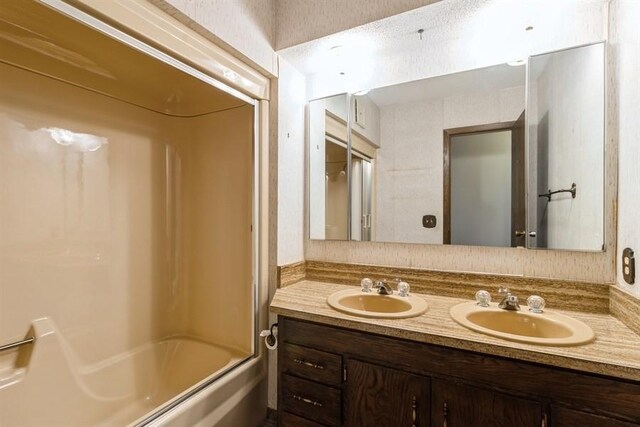 2907 Northwood Dr, Ames, IA 50010 - full bath with double vanity and  shower combination