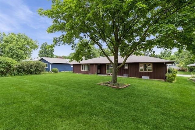 2907 Northwood Dr, Ames, IA 50010 - rear view of house with a yard and board and batten siding