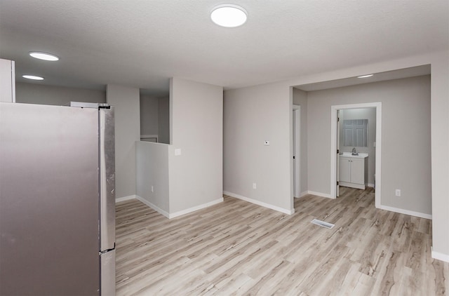 3308 Cambridge St, Des Moines, IA 50313 - spare room featuring light wood finished floors and recessed lighting